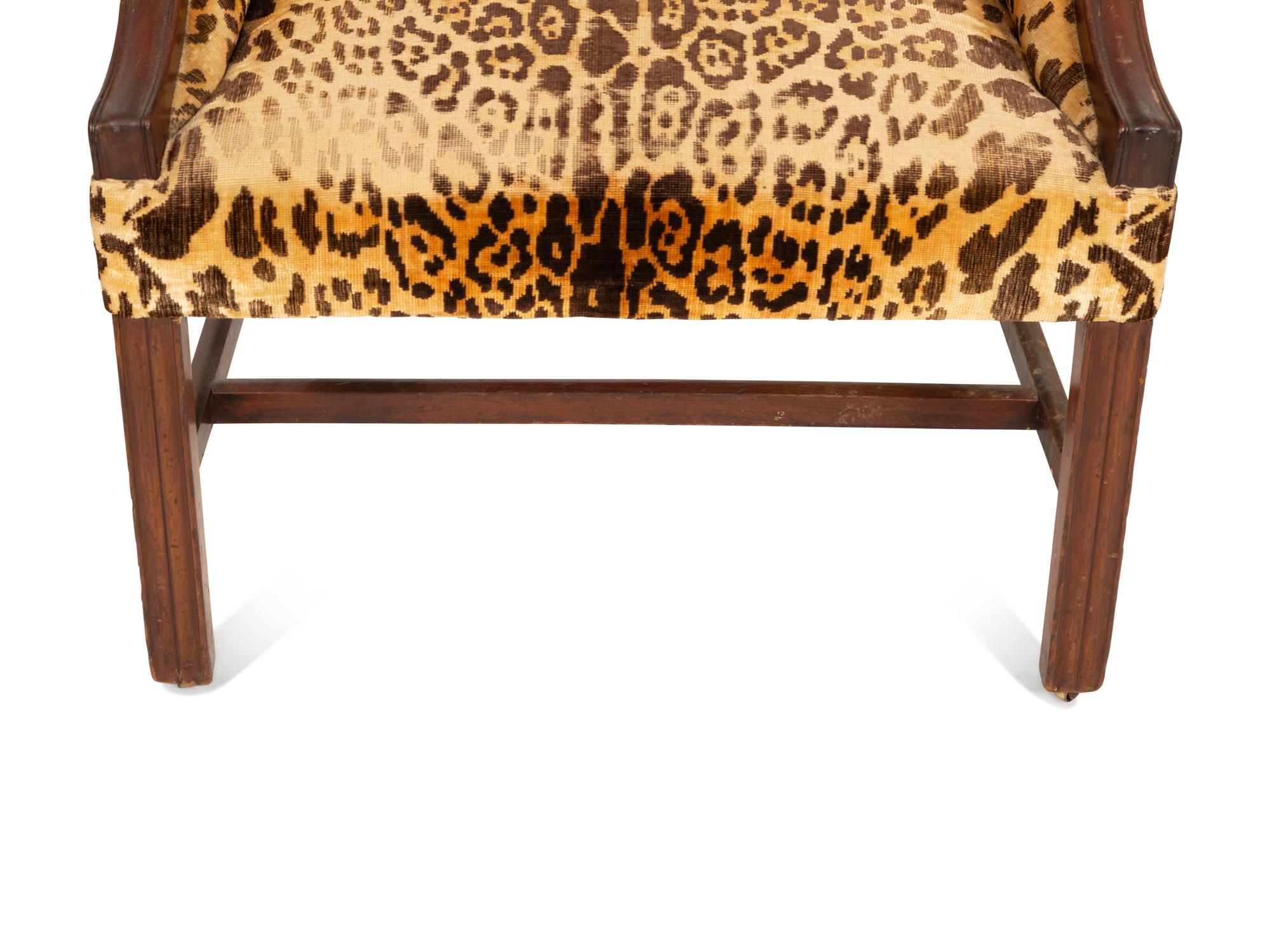 A George III Style Mahogany Wing Chair with Leopard Print Upholstery