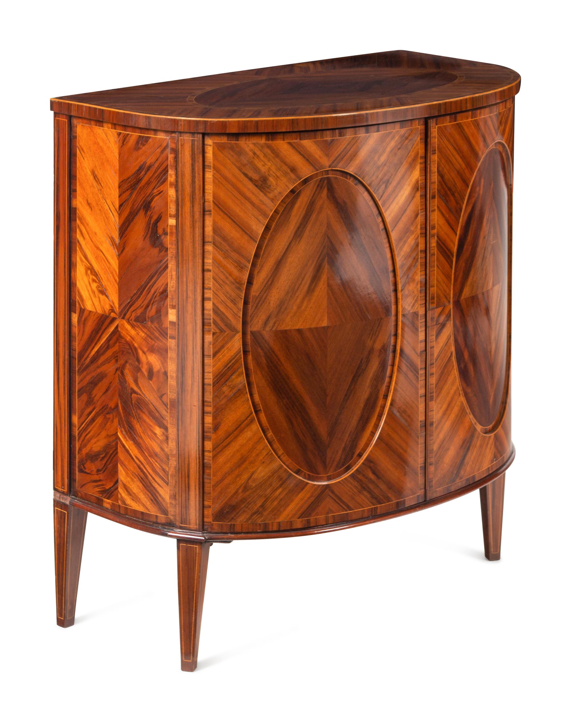 A Pair of George III Goncalo Alves Demilune Cabinets