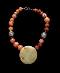 A Chinese Russet and Pale Celadon Jade Belt Buckle
