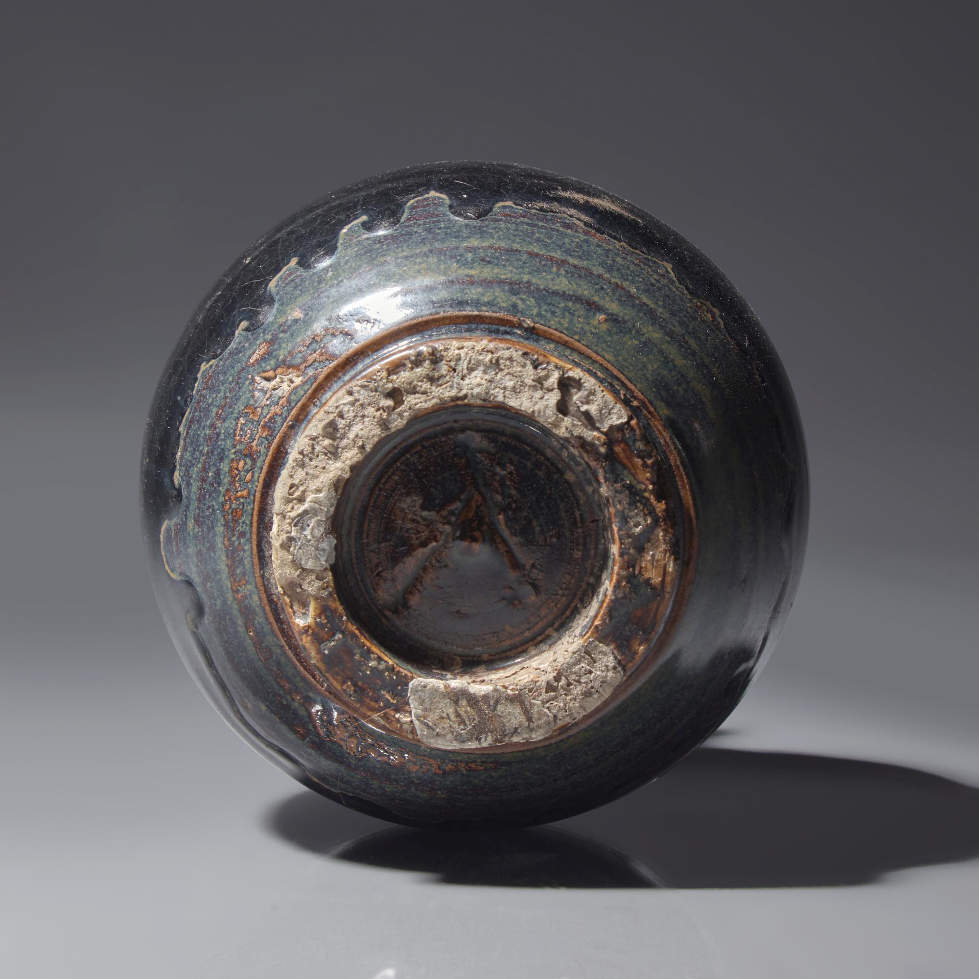 A Chinese Black Glazed Ovoid Jar, Jin/Yuan Dynasty — 金/元 黑釉雙耳罐
