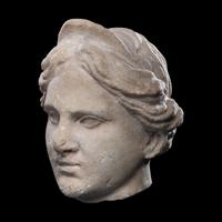 A Roman Marble Head of a Goddess