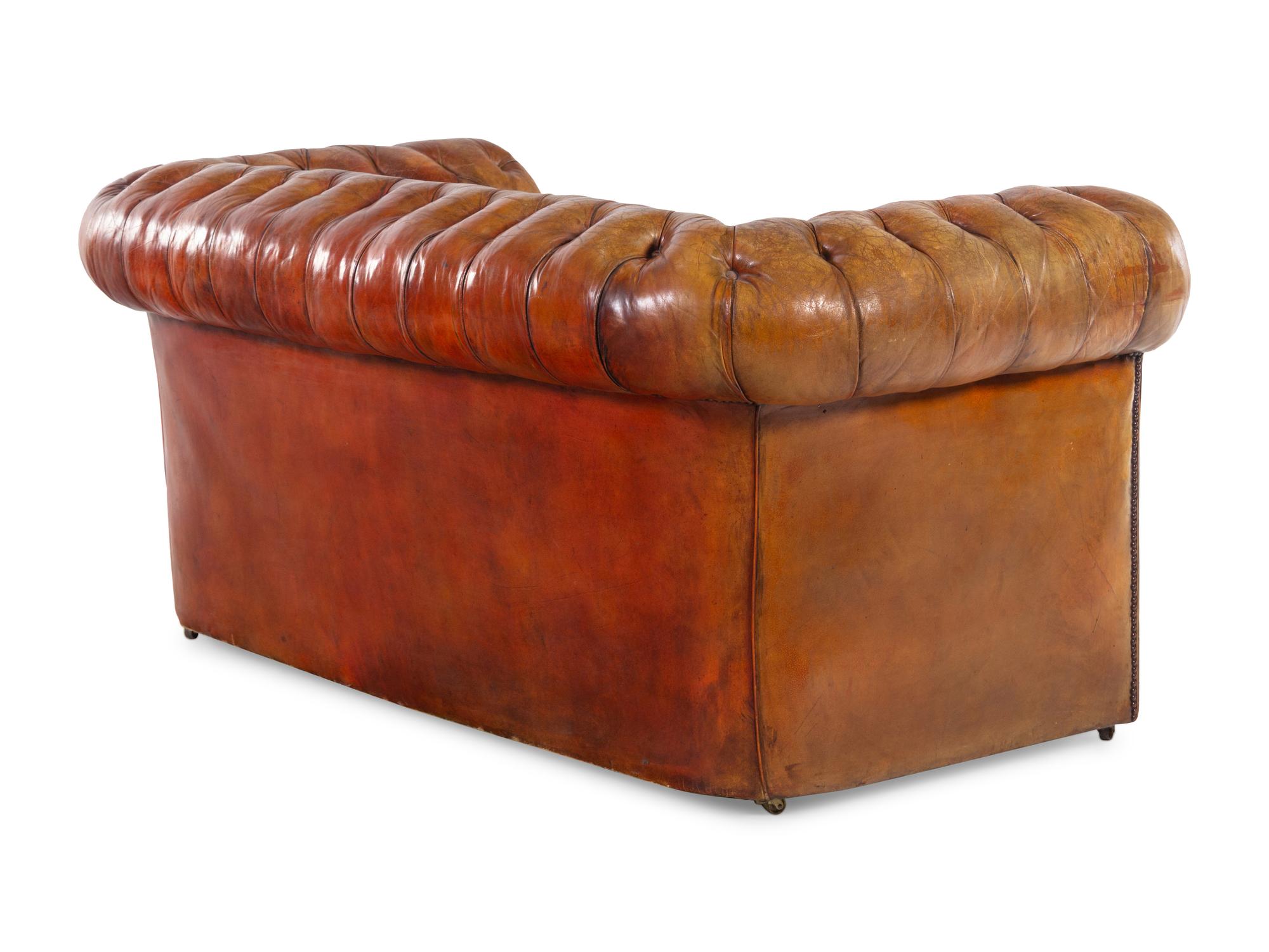 An English Leather Upholstered Chesterfield Sofa
