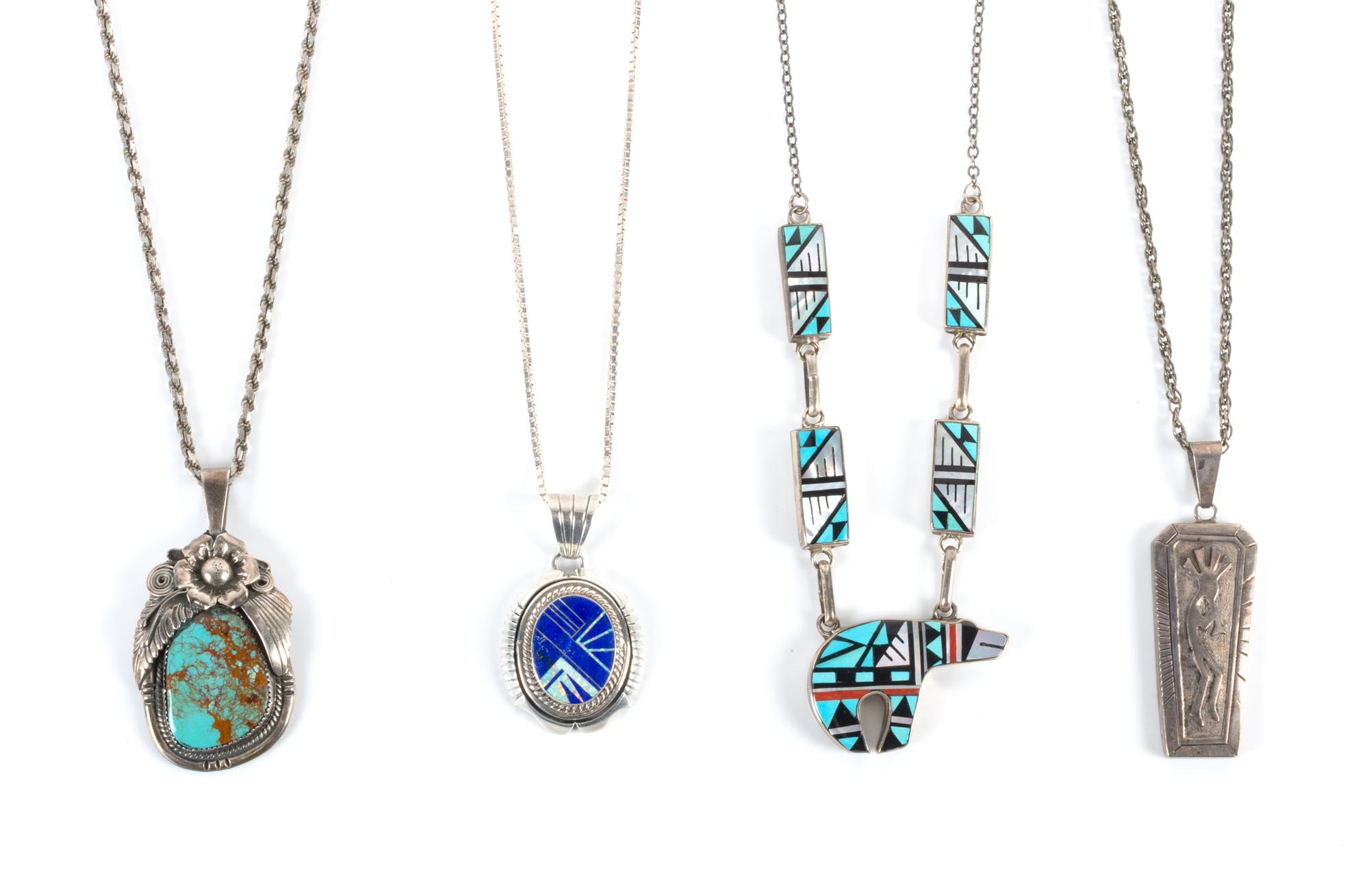 Four Southwestern Pendants Height of largest 2 1/4 inches