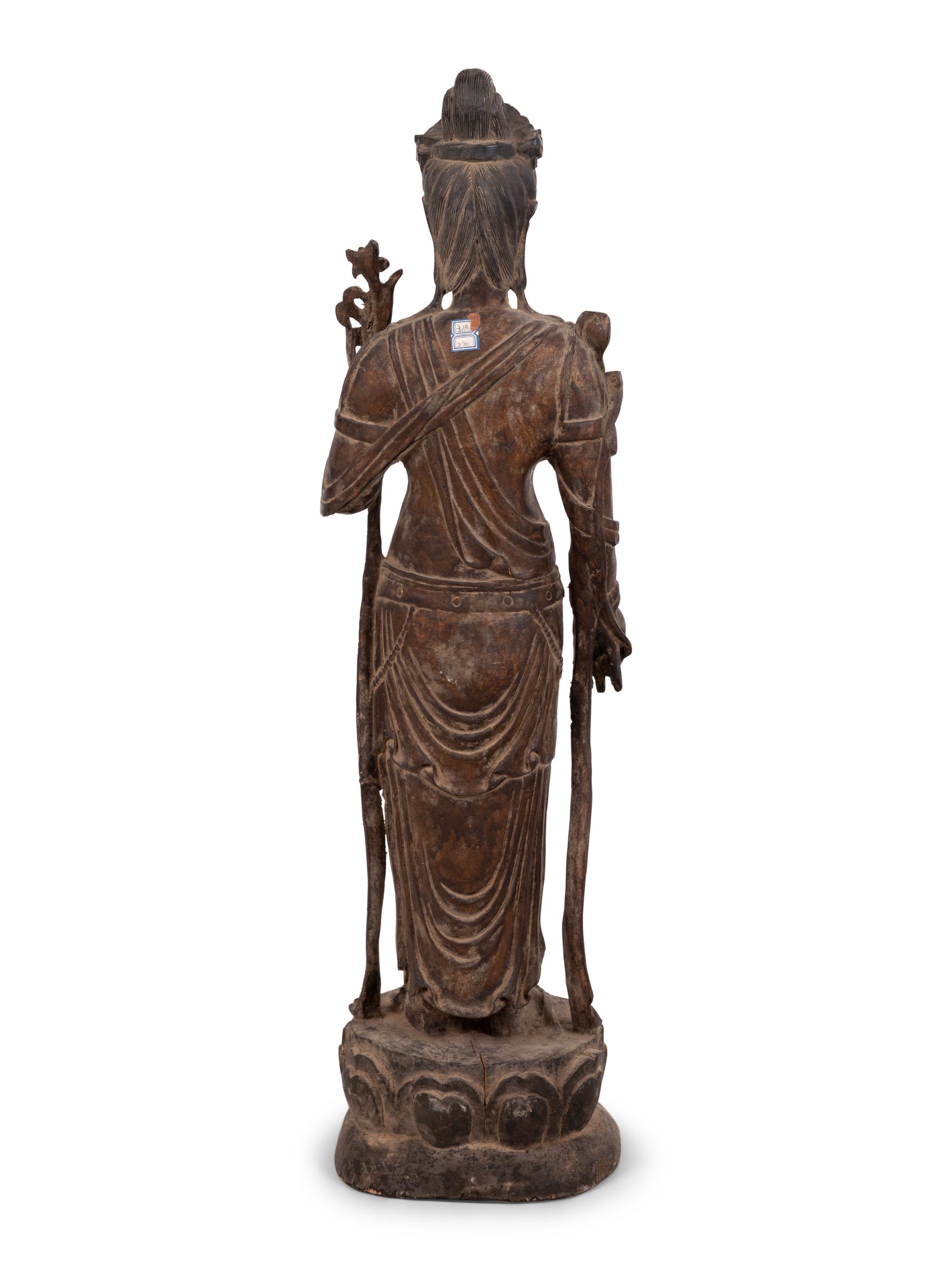 A Chinese Carved Wood Standing Guanyin Figure