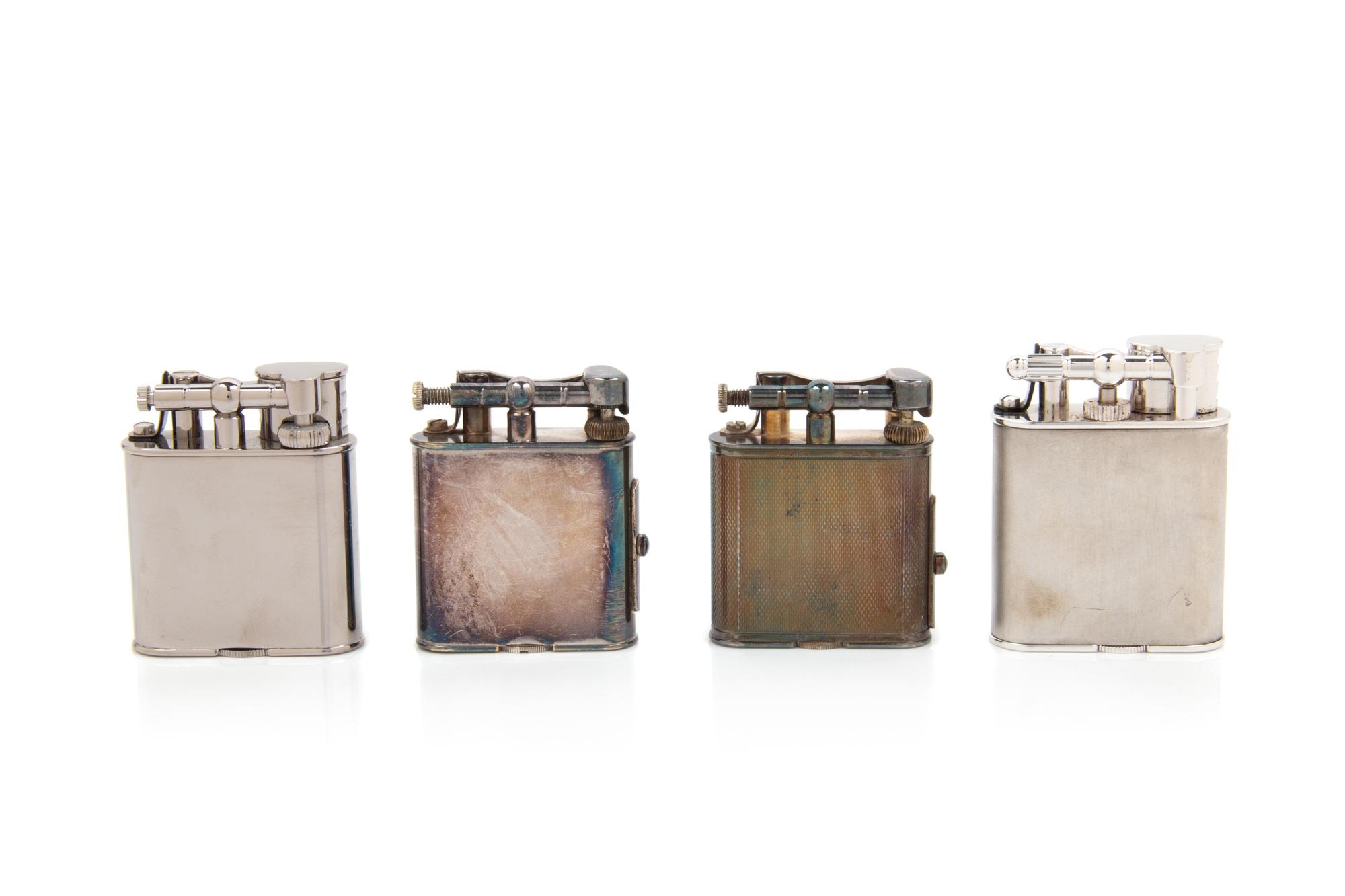 Four Dunhill Lift-Arm Lighters