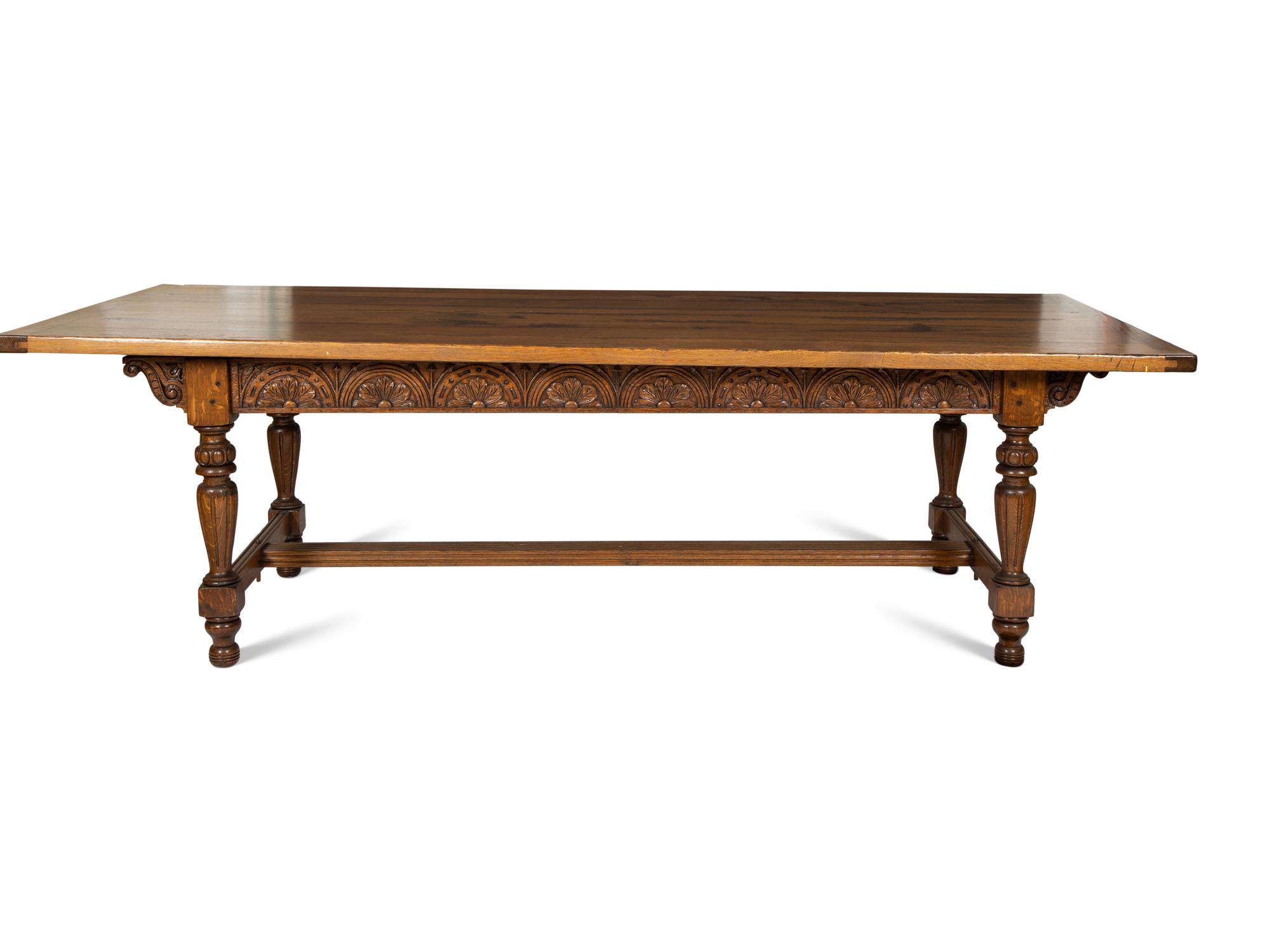 An Arts & Crafts Style Carved Oak Refectory Table