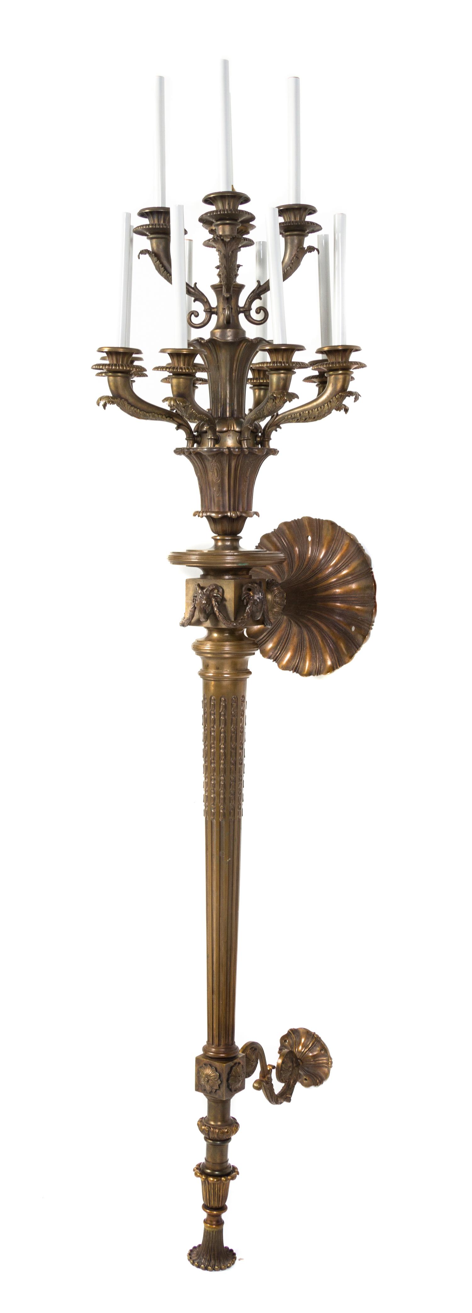 A Neoclassical Style Cast Metal Ten-Light Torchiere, Height 76 inches.