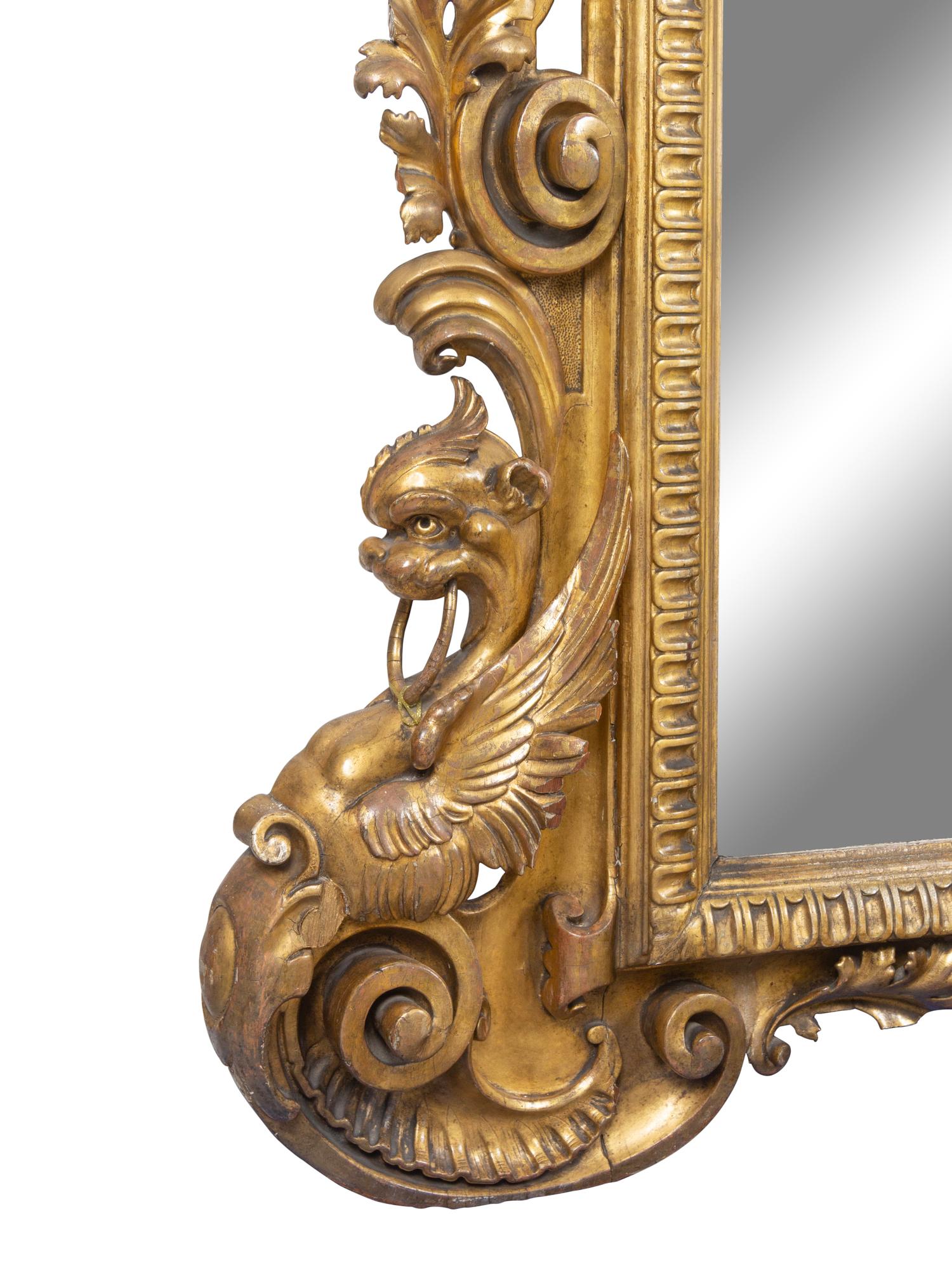 A Large Italian Baroque Style Giltwood Mirror