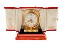 A Cartier Art Deco 18K Traveling Desk Clock — CIRCA 1940's