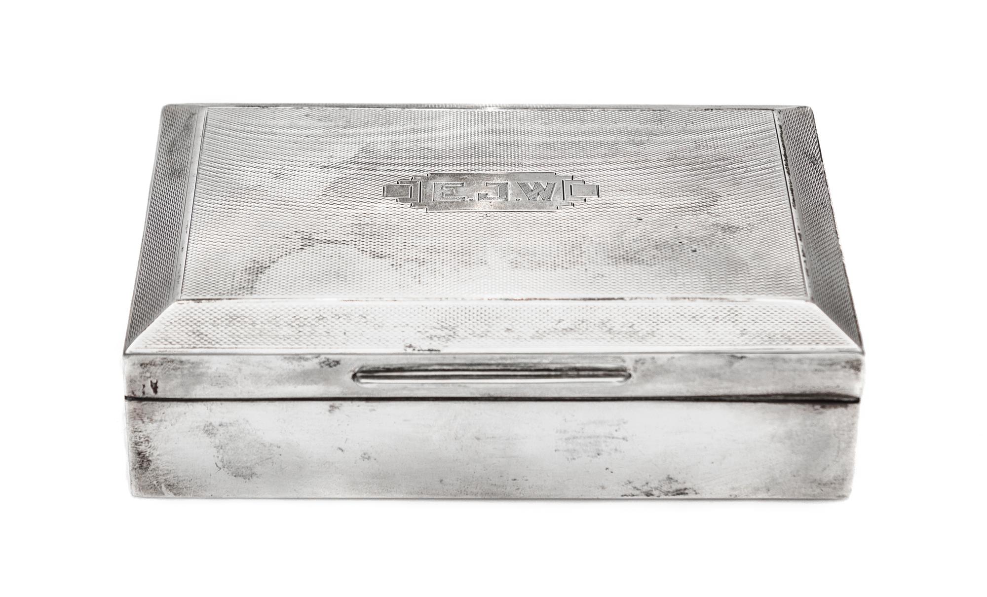 A George VI Silver Cigarette Box, Ernest W. Haywood, Birmingham, 1939, of rectangular form with a wood liner.