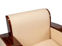 A Pair of Art Deco Style Rosewood Lounge Chairs