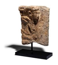 An Egyptian Limestone Fragment with a Dignitary