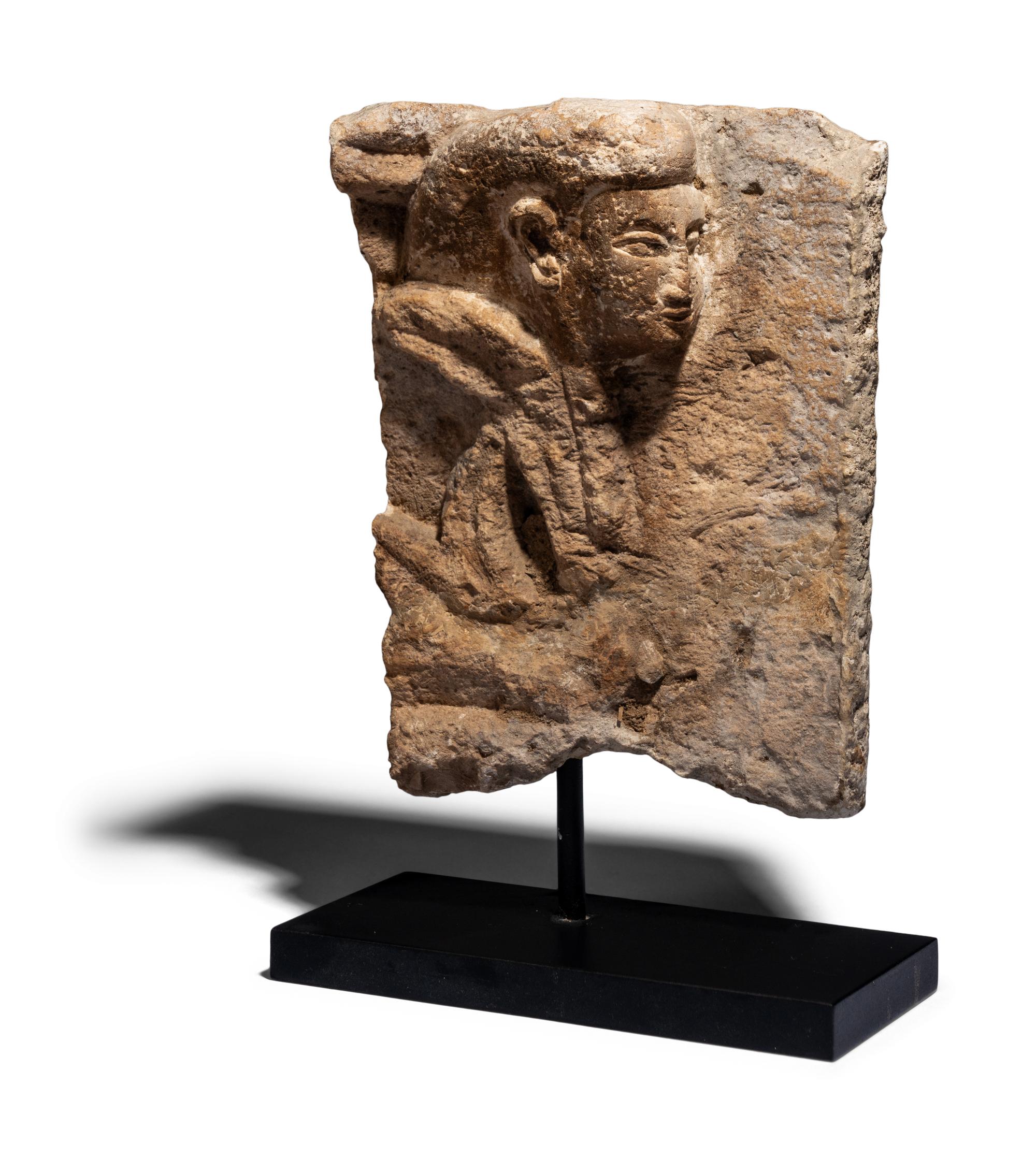 An Egyptian Limestone Fragment with a Dignitary