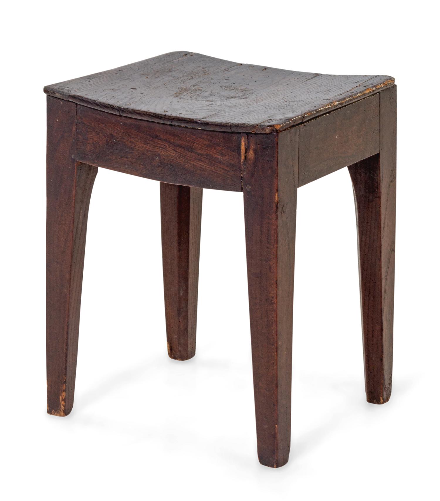 An English Provincial Elmwood Saddletop Stool — LATE 18TH/EARLY 19TH CENTURY