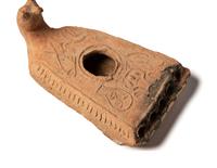 A Group of 19 Holy Land Terracotta Oil Lamps, Pottery, and Bronze Blades