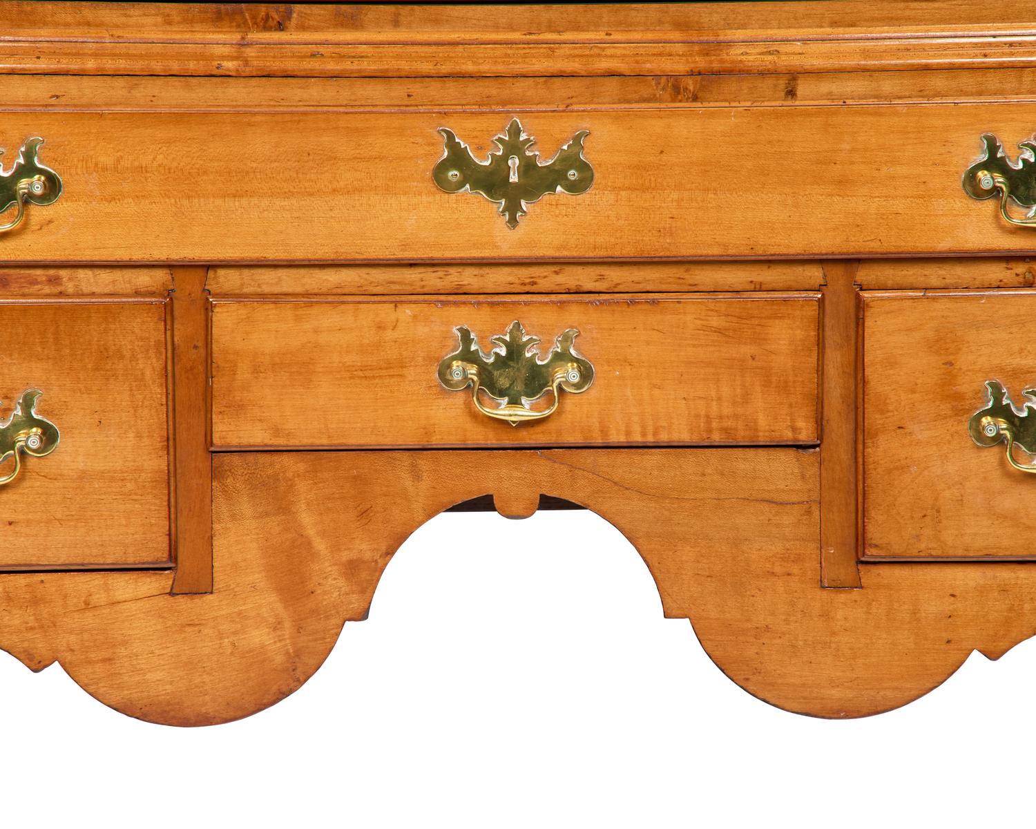 A Queen Anne Maple High Chest of Drawers