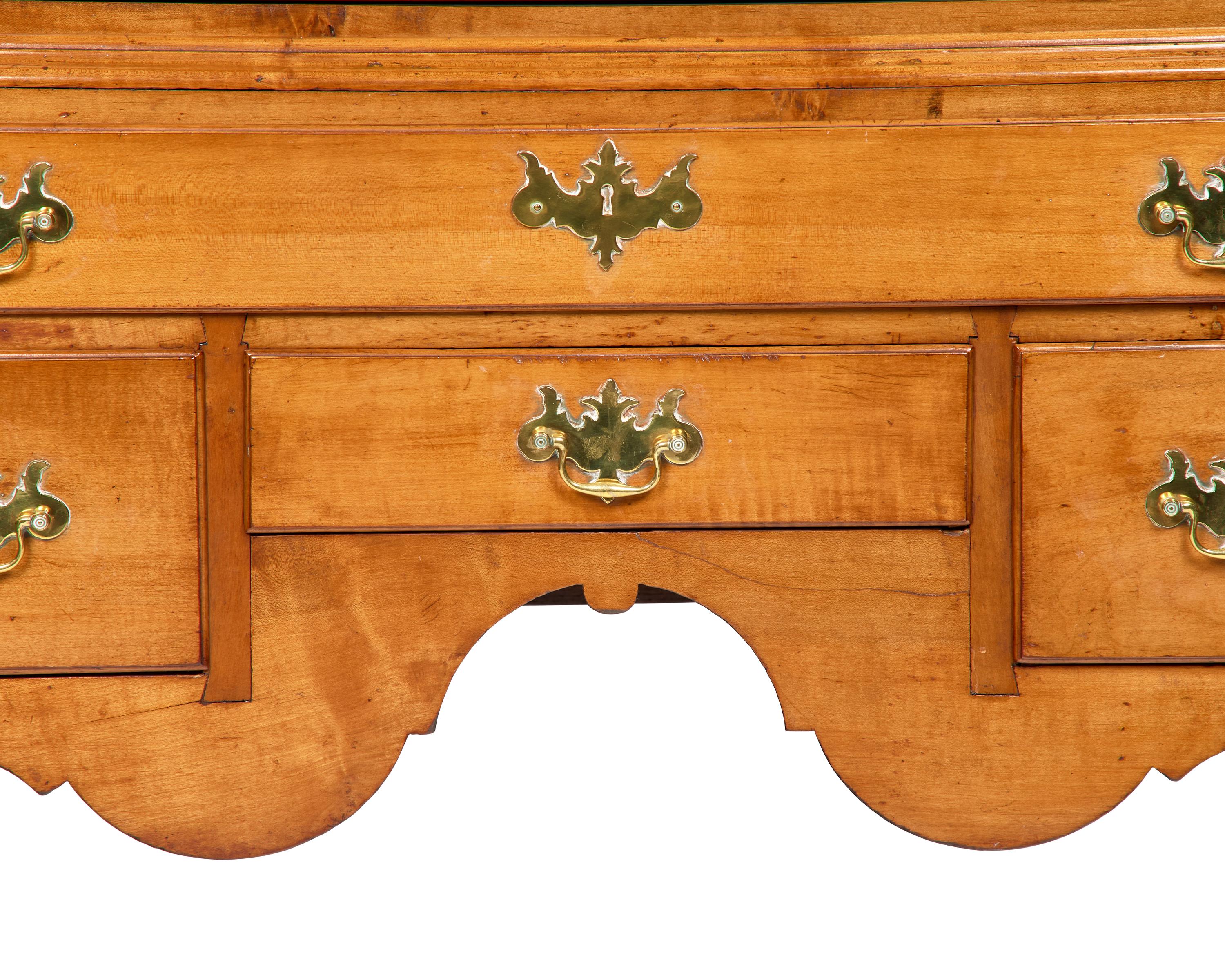 A Queen Anne Maple High Chest of Drawers