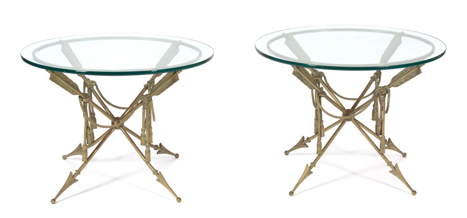 A Pair of Regency Style Arrow-Form Bronze and Glass Top Side Tables Height 18 1/2 x diameter 26 inches. — 20TH CENTURY
