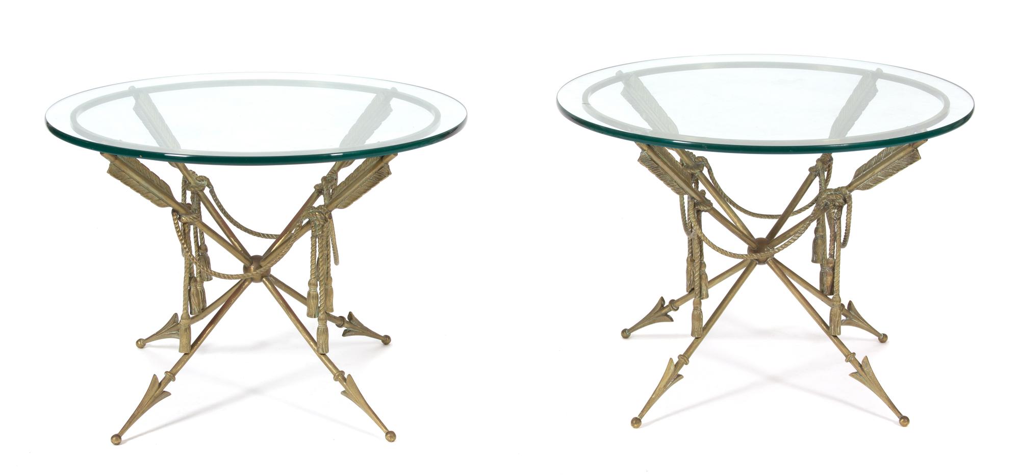 A Pair of Regency Style Arrow-Form Bronze and Glass Top Side Tables Height 18 1/2 x diameter 26 inches. — 20TH CENTURY