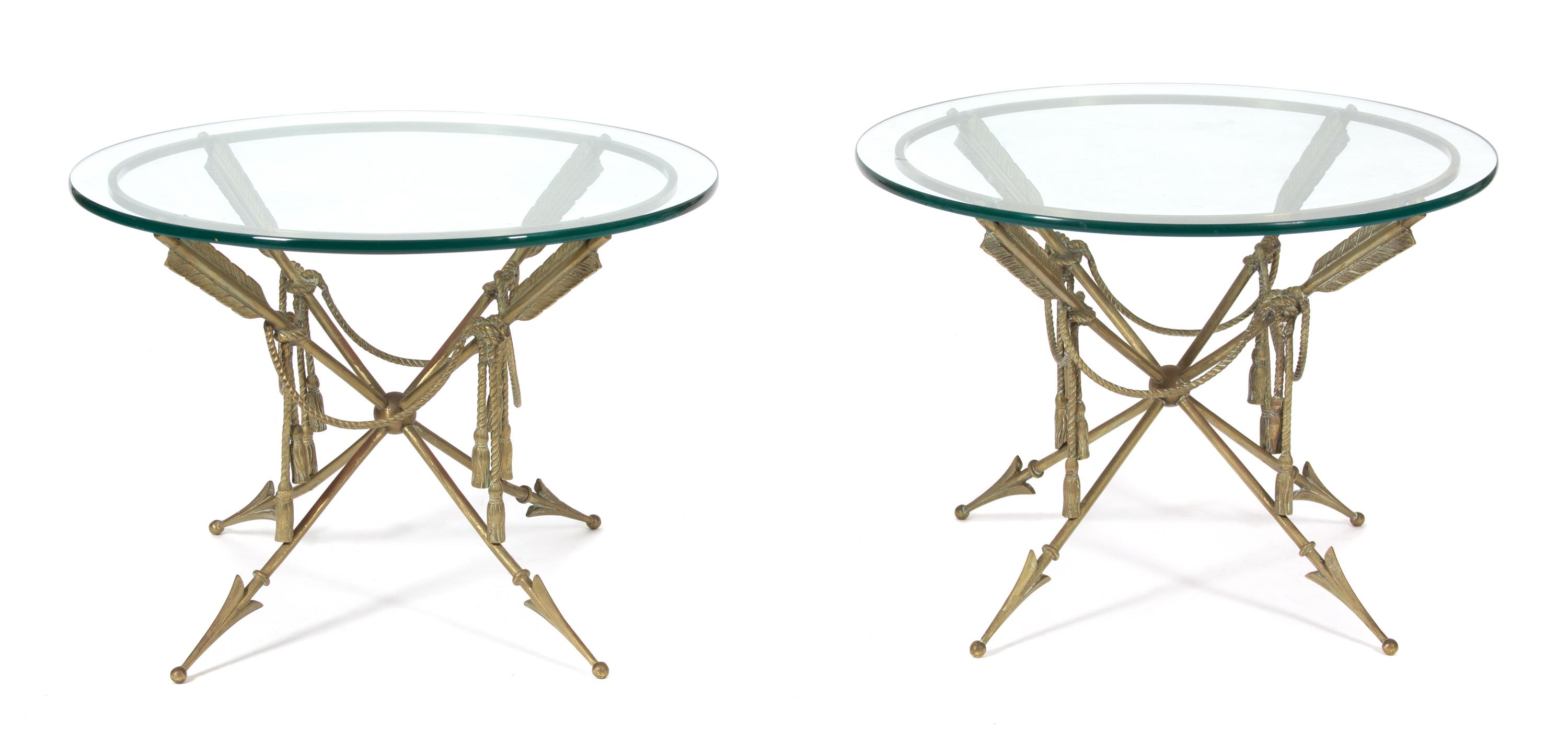A Pair of Regency Style Arrow-Form Bronze and Glass Top Side Tables Height 18 1/2 x diameter 26 inches. — 20TH CENTURY