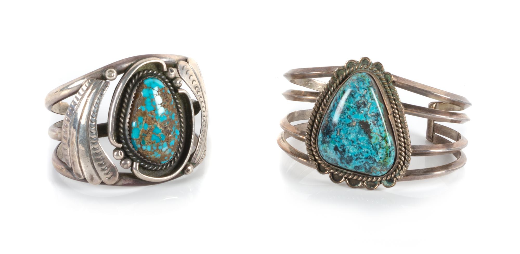 Two Southwestern Silver and Turquoise Cuff Bracelets Length of largest 5 3/4 x opening 1 1/4 x width 1 7/8 inches