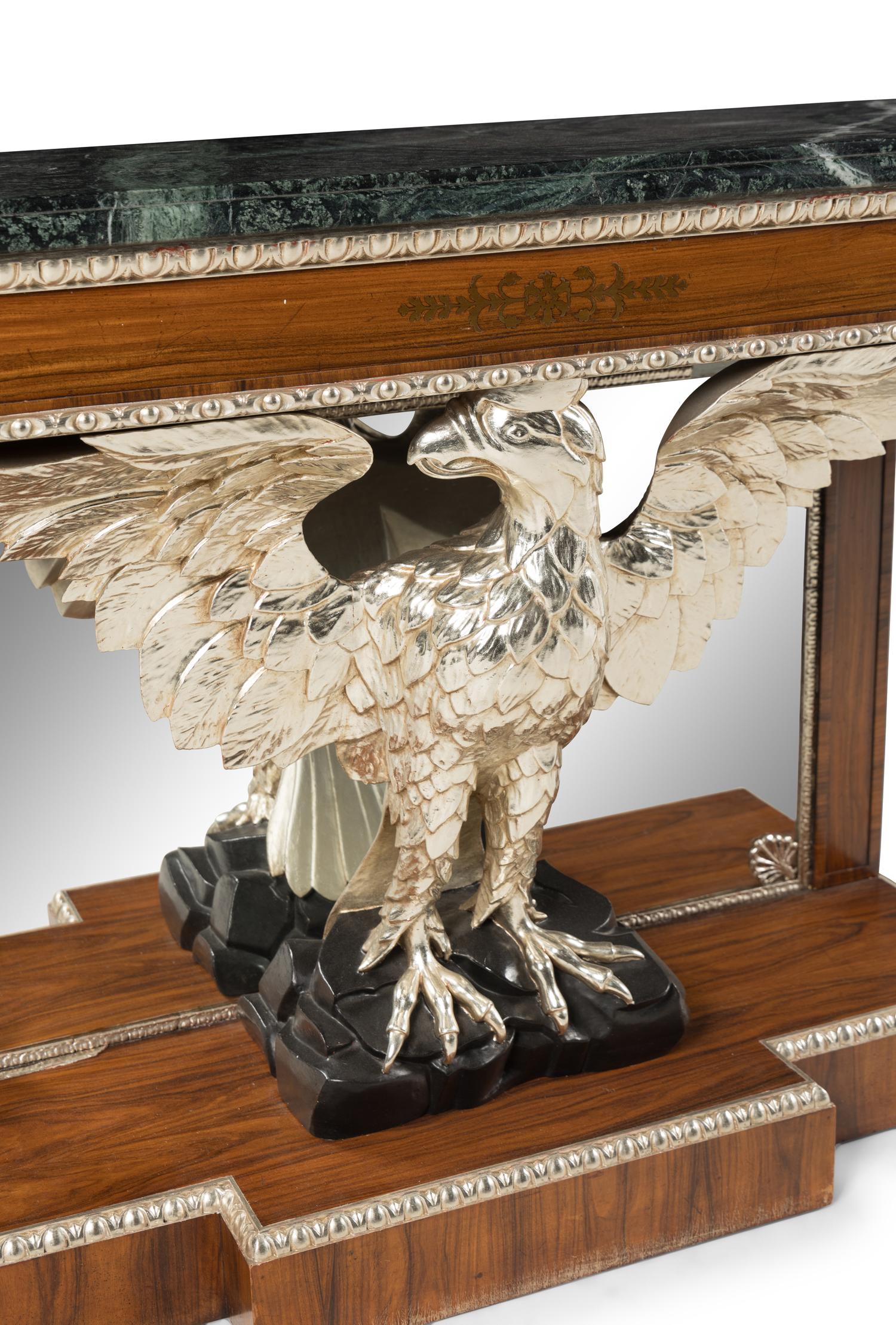 A Pair of Regency Style Rosewood, Brass-Inlaid, Carved and Silvered Marble-Top Console Tables