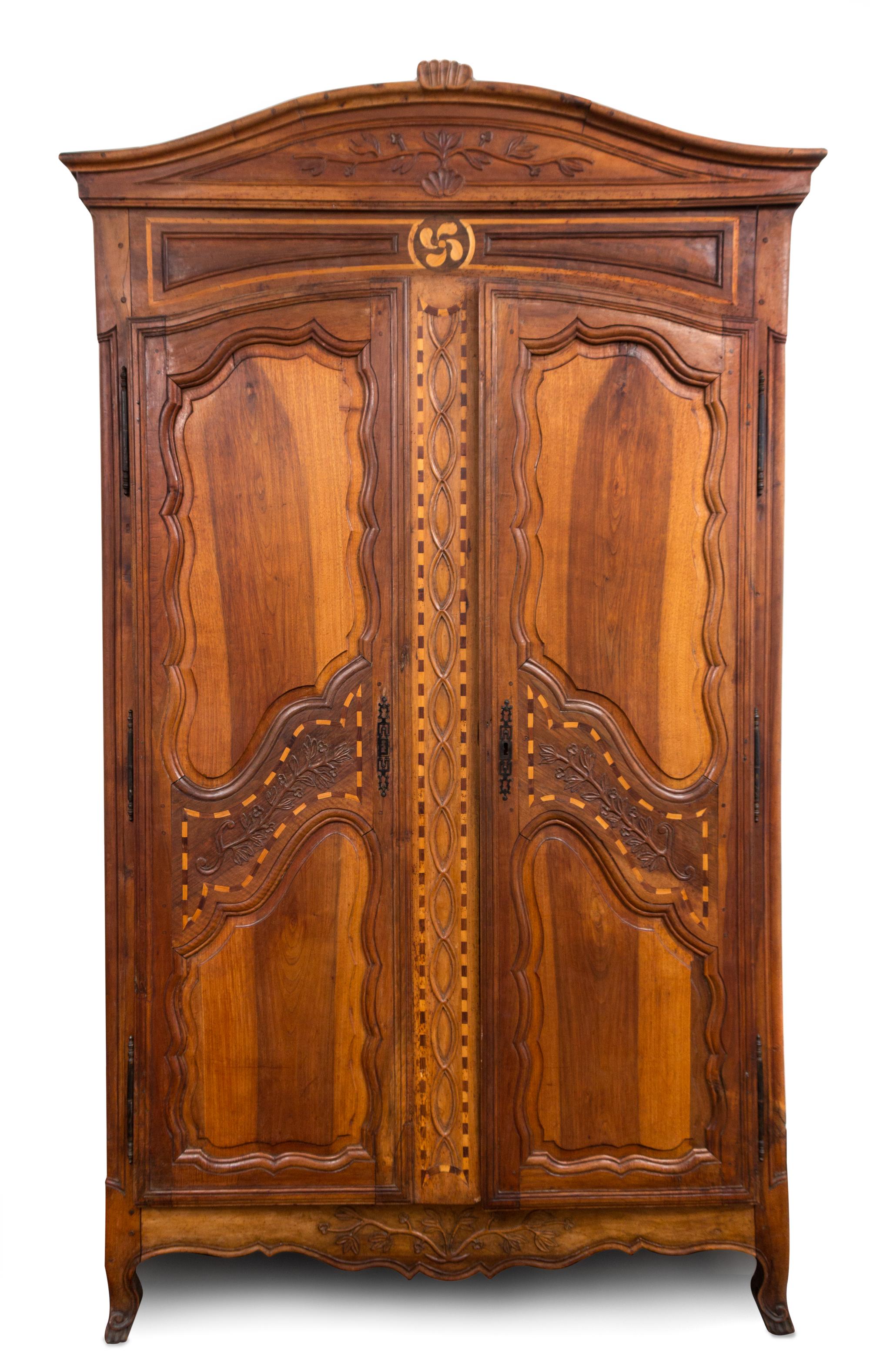 A French Provincial Inlaid Walnut and Fruitwood Armoire Height 100 x width 58 x depth 25 inches. — 18TH/19TH CENTURY
