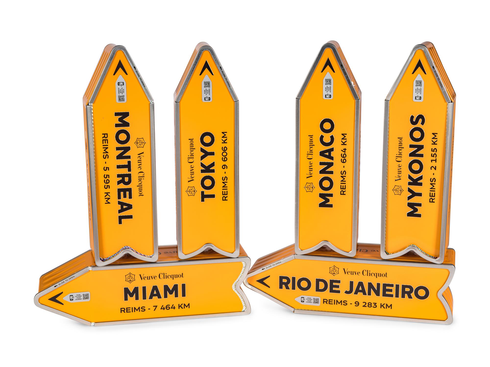 A Set of Six Veuve Clicquot "Arrow" Gift Tins