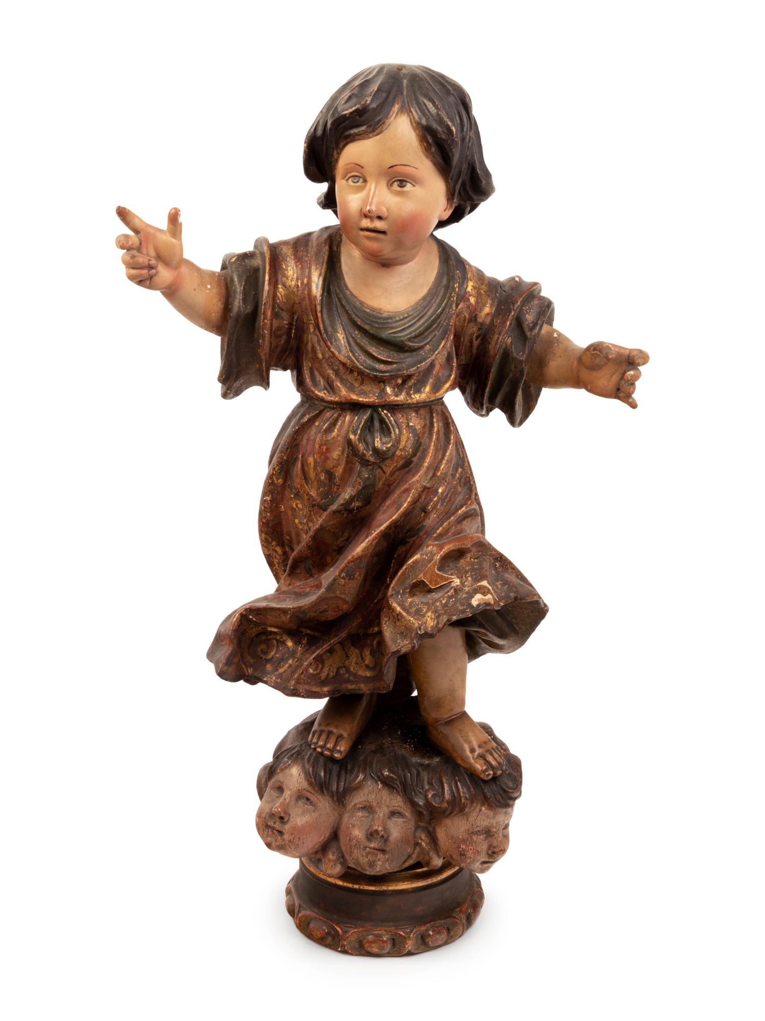 A Continental Parcel Gilt and Polychrome Decorated Putto