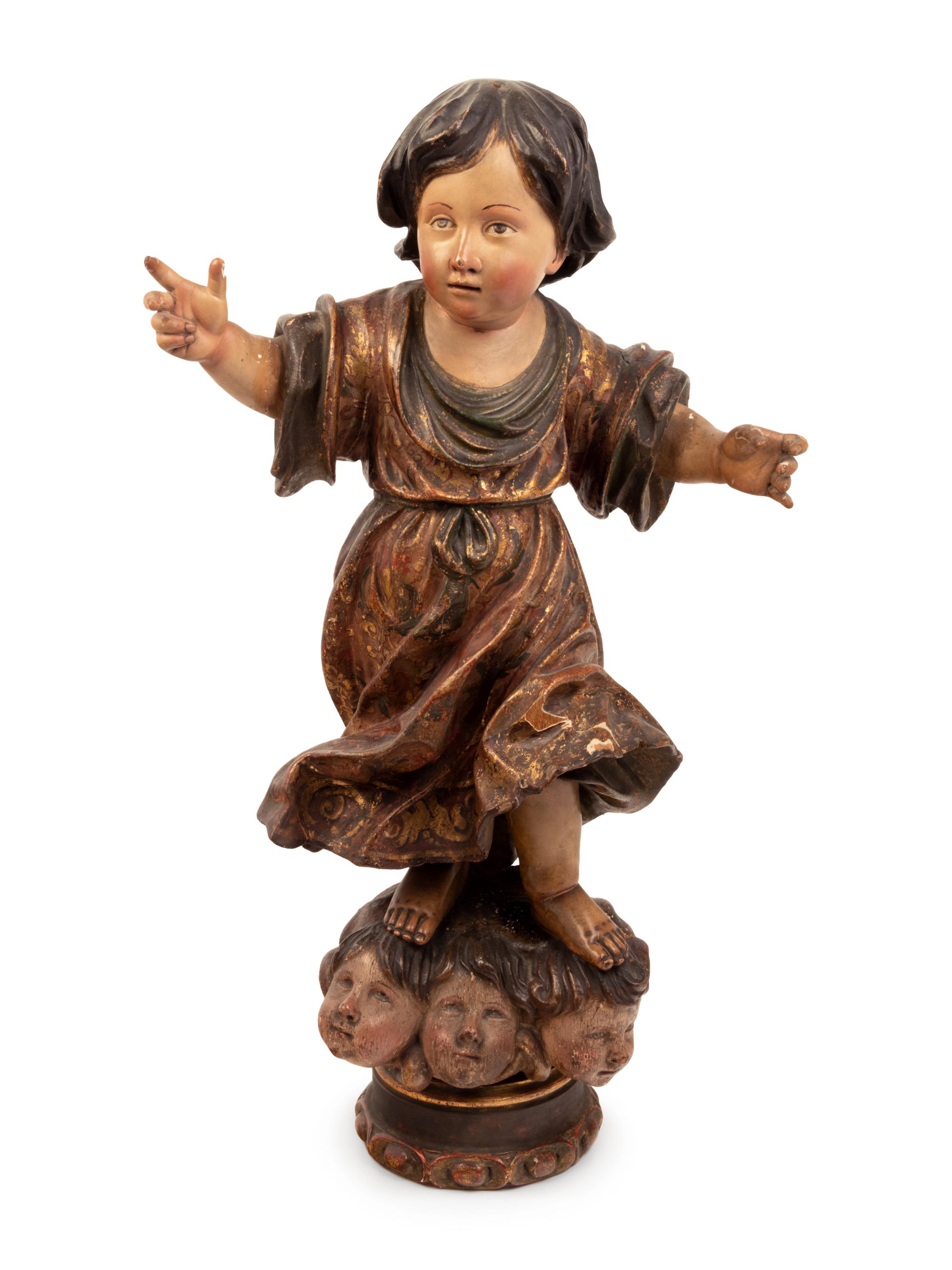 A Continental Parcel Gilt and Polychrome Decorated Putto