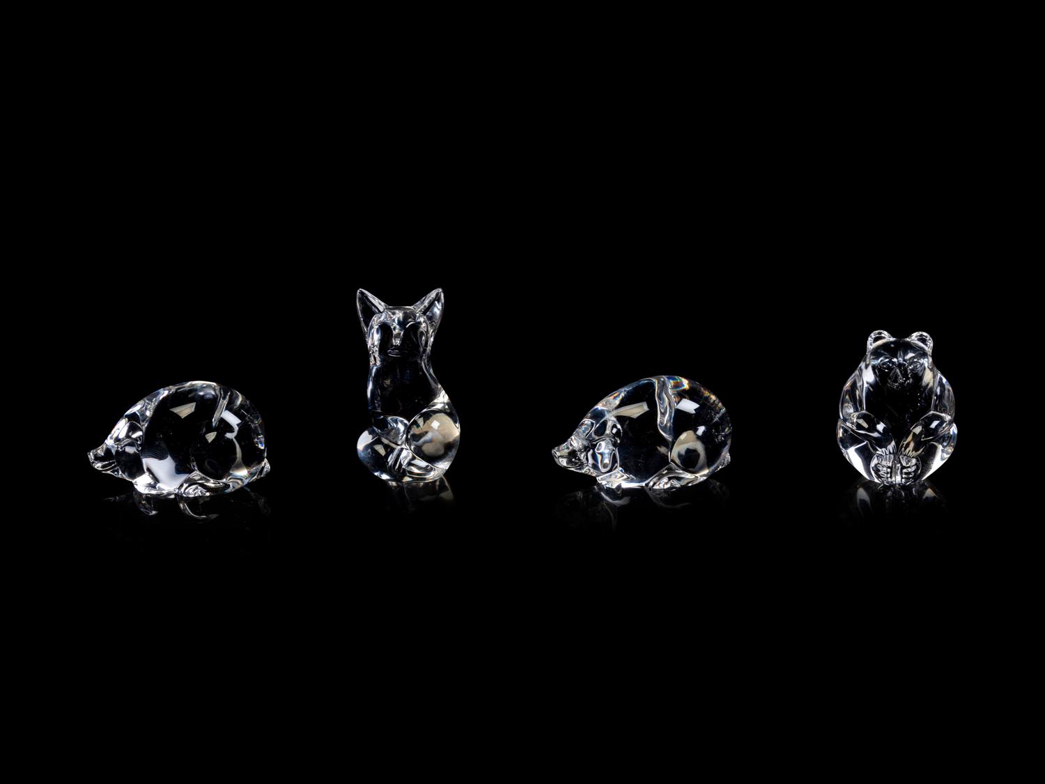 A Collection of Twelve Steuben Hand Coolers and Small Animals