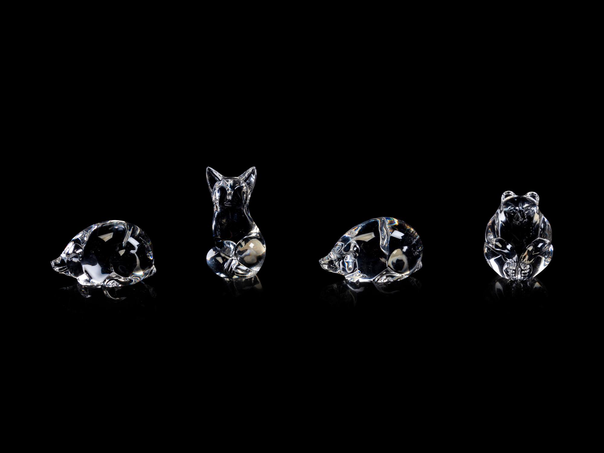 A Collection of Twelve Steuben Hand Coolers and Small Animals