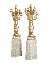 A Pair of Louis XVI Style Gilt Bronze and White Marble Ten-Light Candelabra