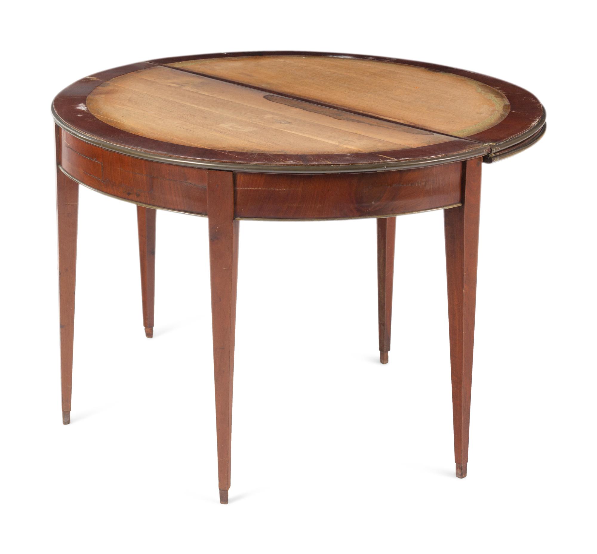 A Directoire Style Brass-Mounted Mahogany Flip-Top Table