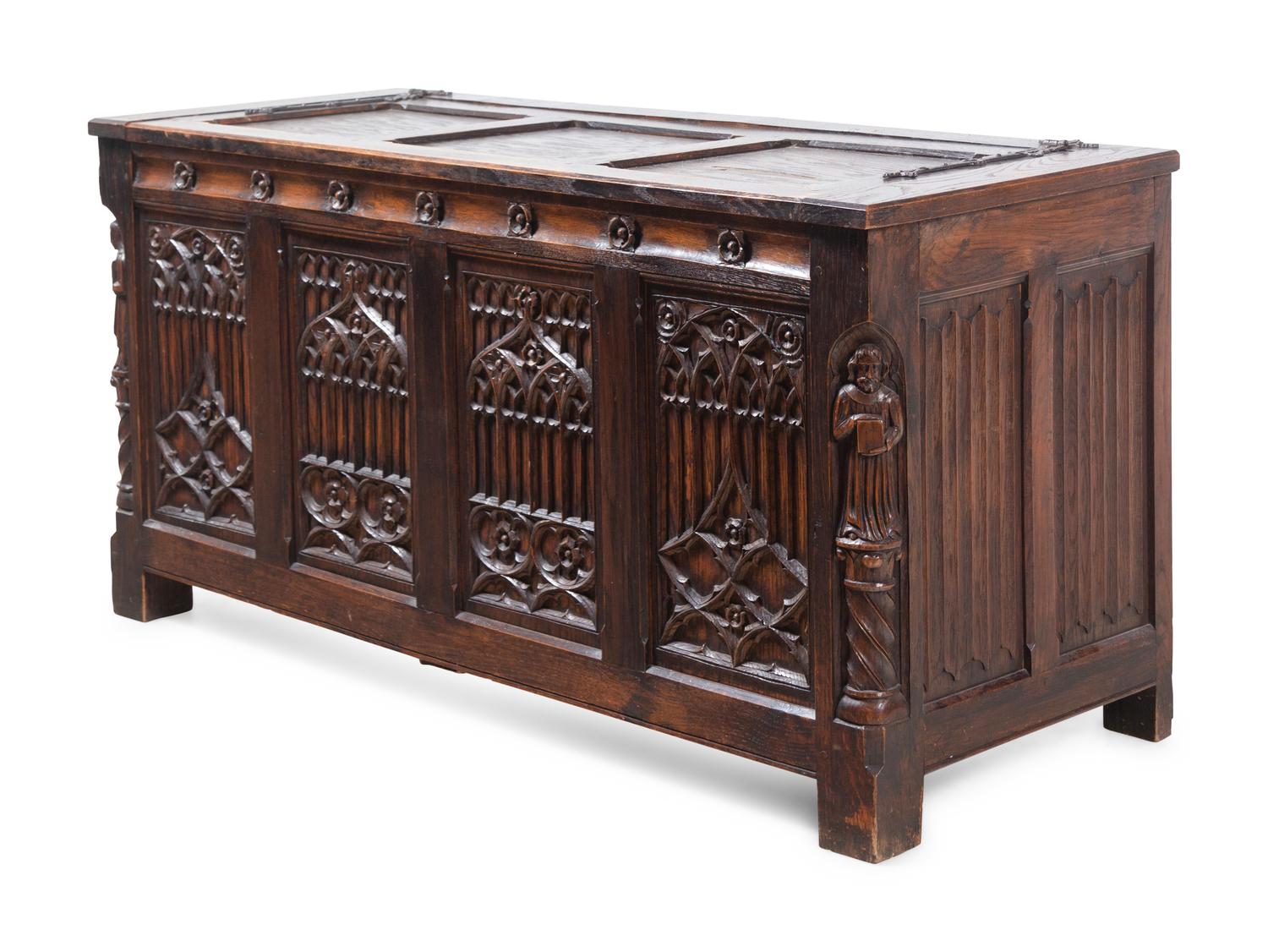 A Gothic Revival Carved Oak Chest