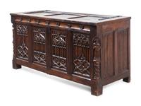 A Gothic Revival Carved Oak Chest