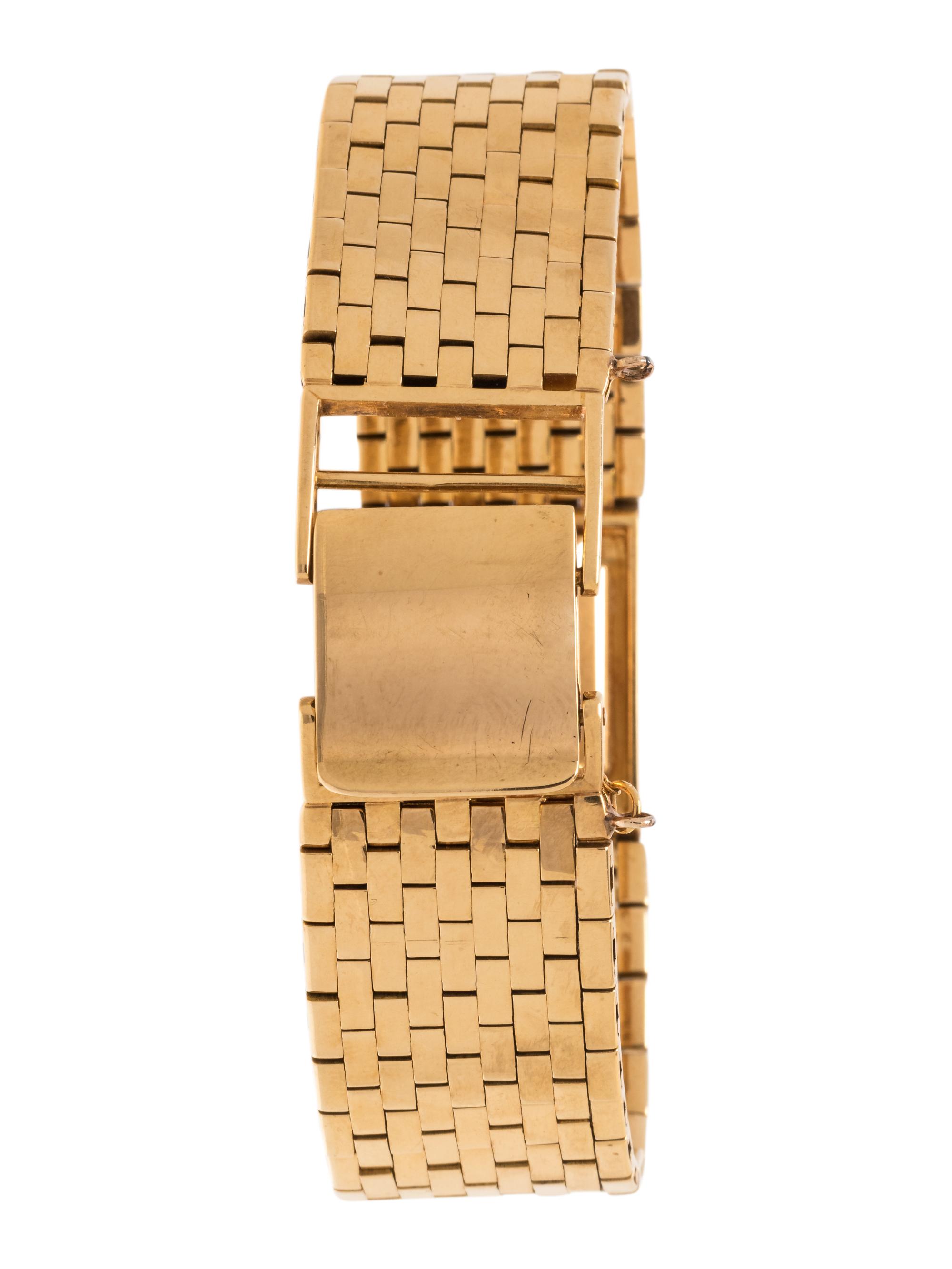 18K YELLOW GOLD SURPRISE WRISTWATCH