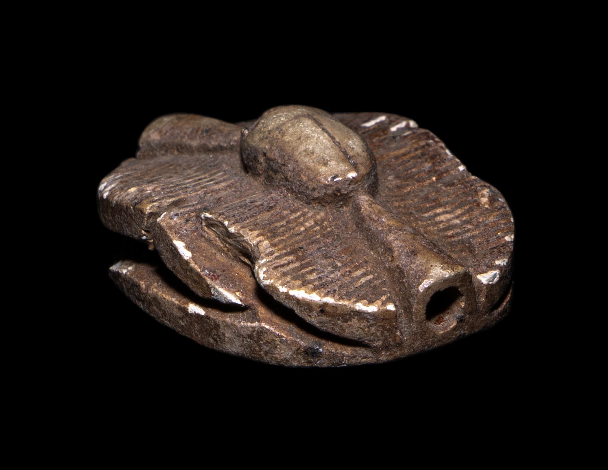 An Egyptian Faience Scarab Bead