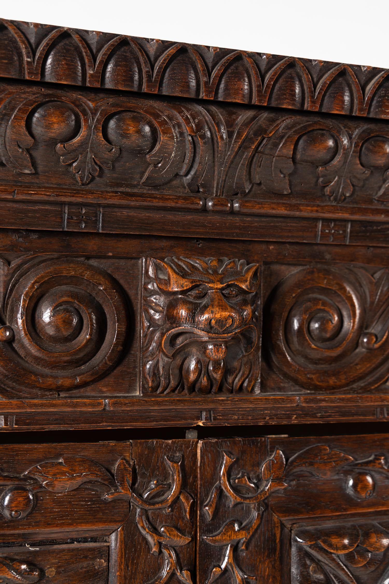A Continental Carved Oak Wardrobe Cabinet