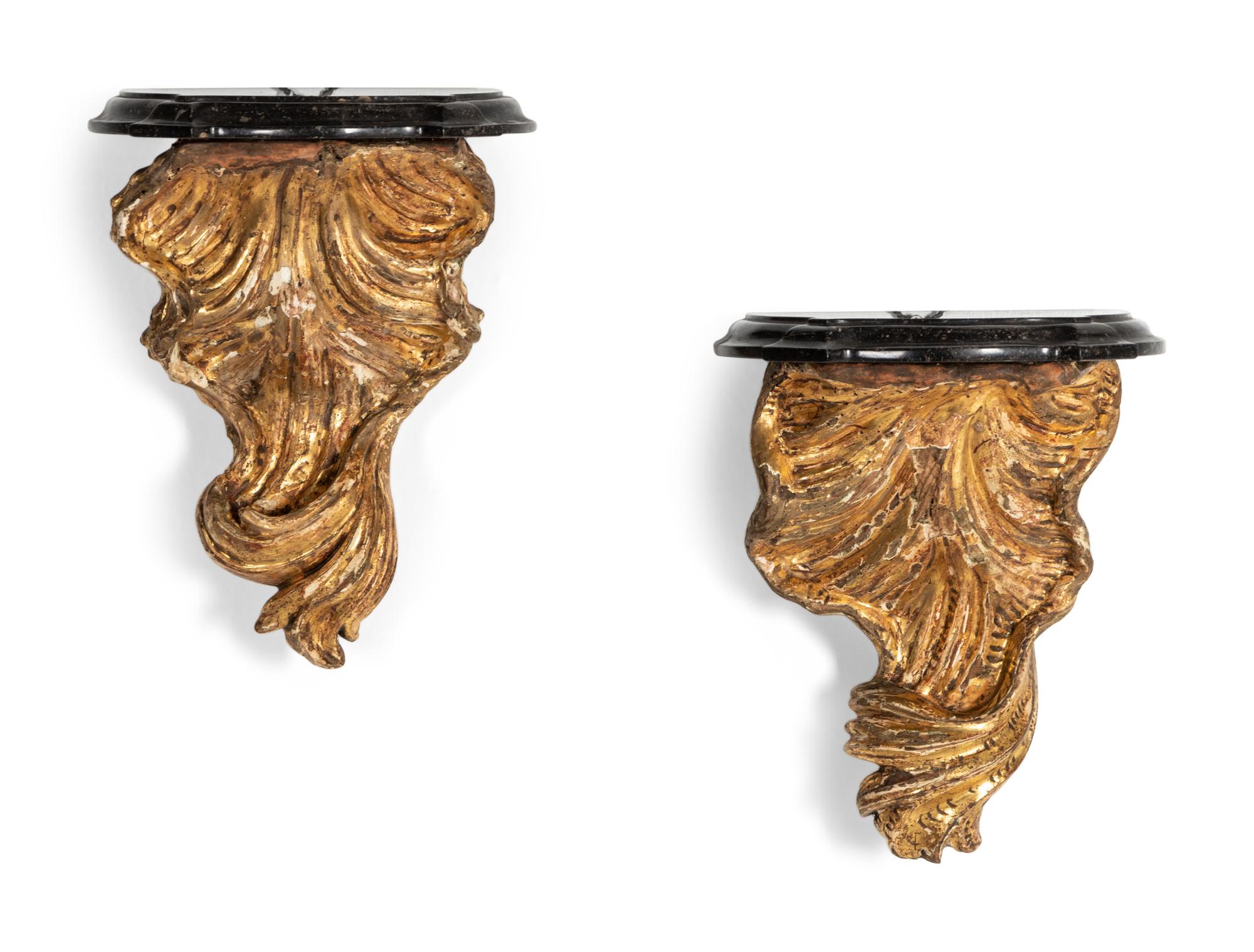 A Pair of Continental Giltwood Marble-Top Brackets
