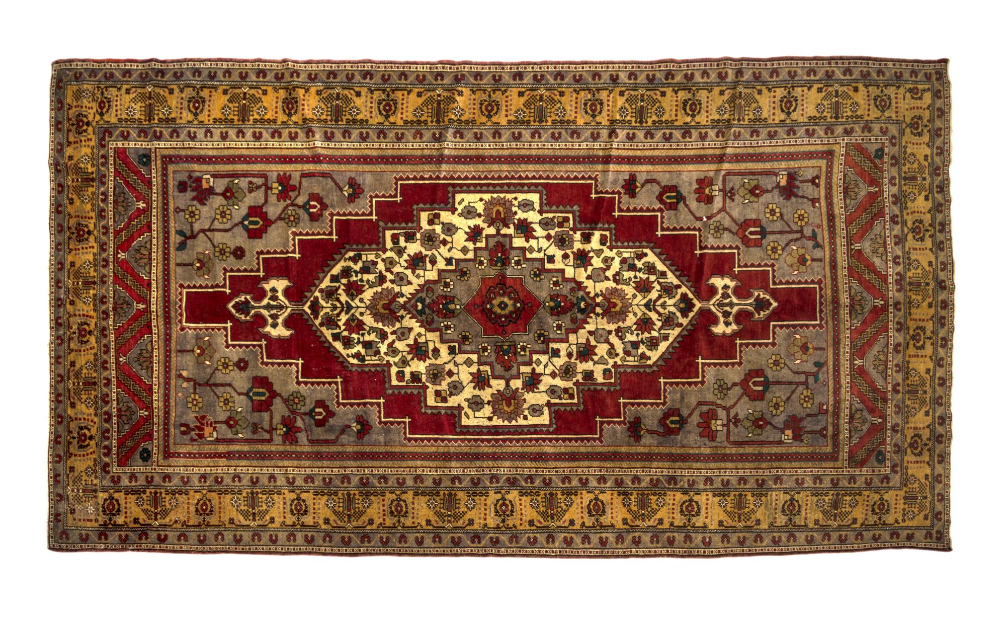 An Oushak Wool Rug, TURKEY, CIRCA 1920S, 7 feet 2 inches x 12 feet 8 inches. — TURKEY, CIRCA 1930s