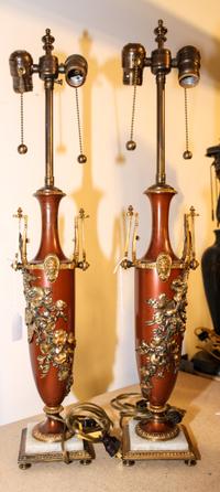 A Pair of Patinated Gilt Bronze Lamps Height of vases 16 inches.