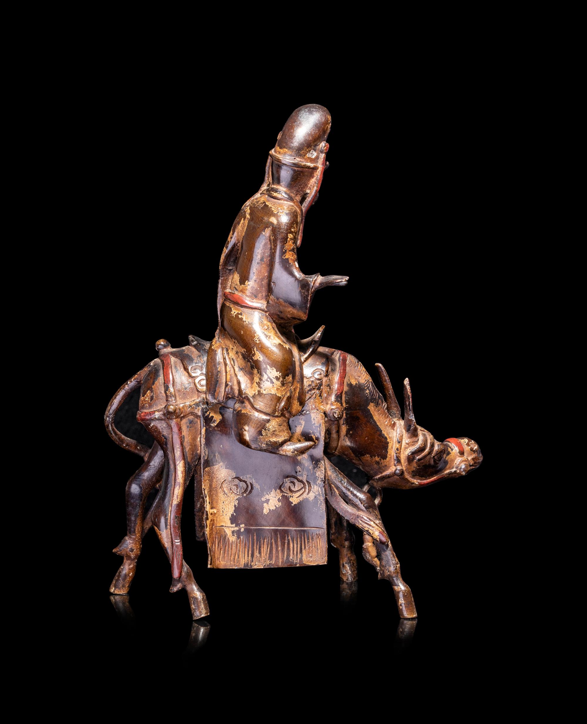 A Chinese Parcel-Gilt Bronze Figural-Form Incense Burner