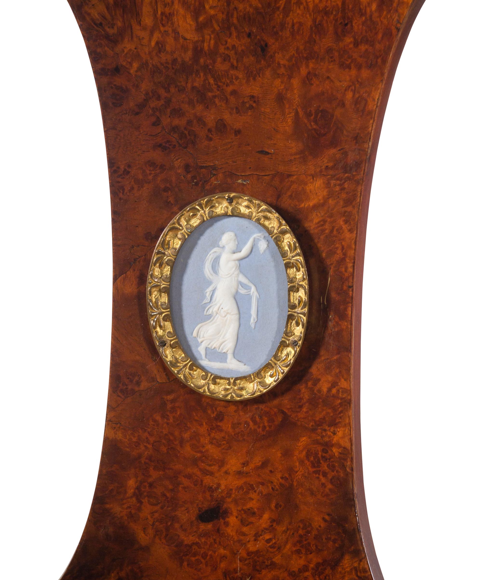 A French Gilt Bronze and Jasperware Mounted Burlwood Dining Suite