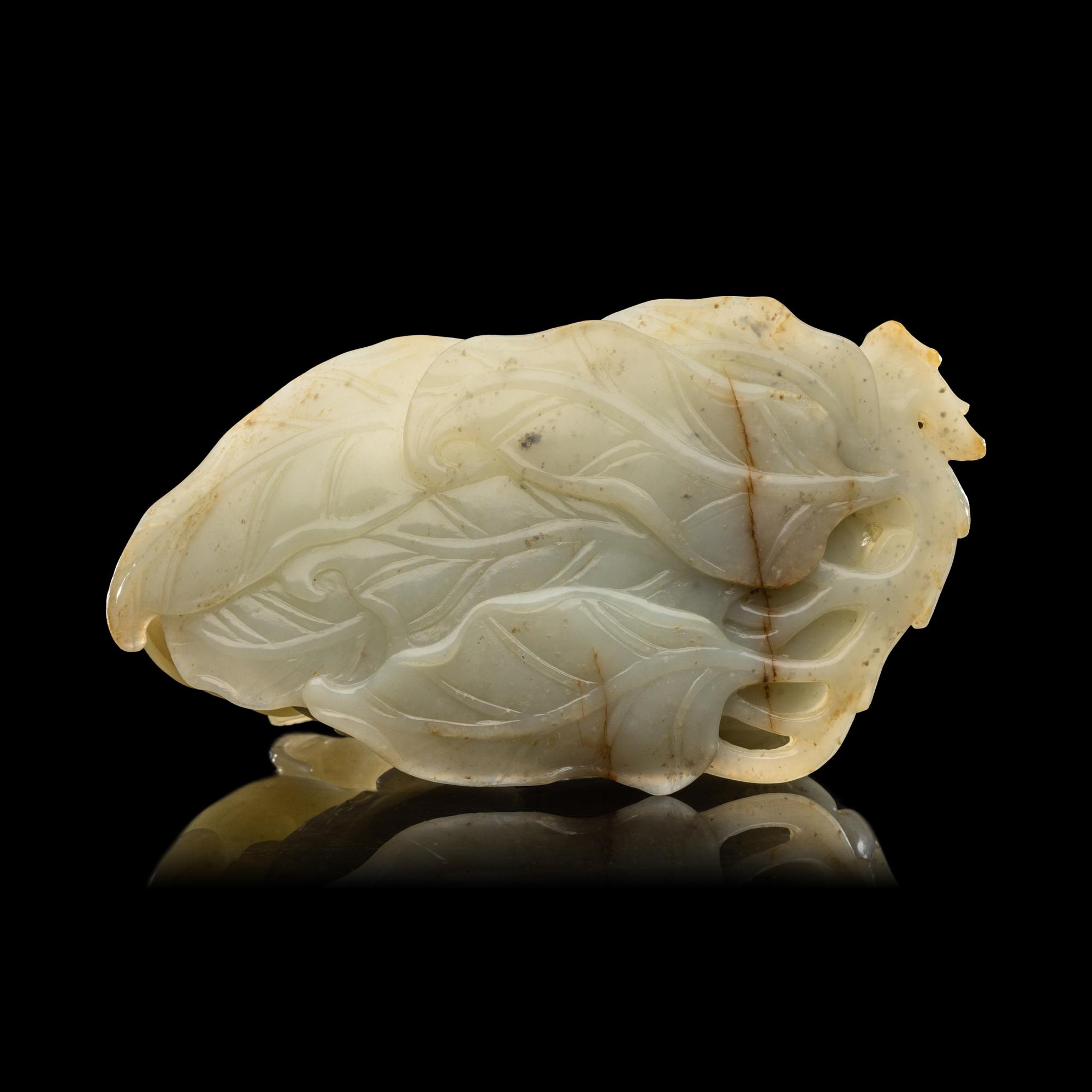 A Chinese Pale Celadon Jade 'Three Rams' Carving 青白玉三羊開泰