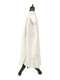 A Victorian Child's Mannequin Dressed in a White Christening Dress — 19TH CENTURY