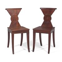 A Pair of Regency Mahogany Hall Chairs