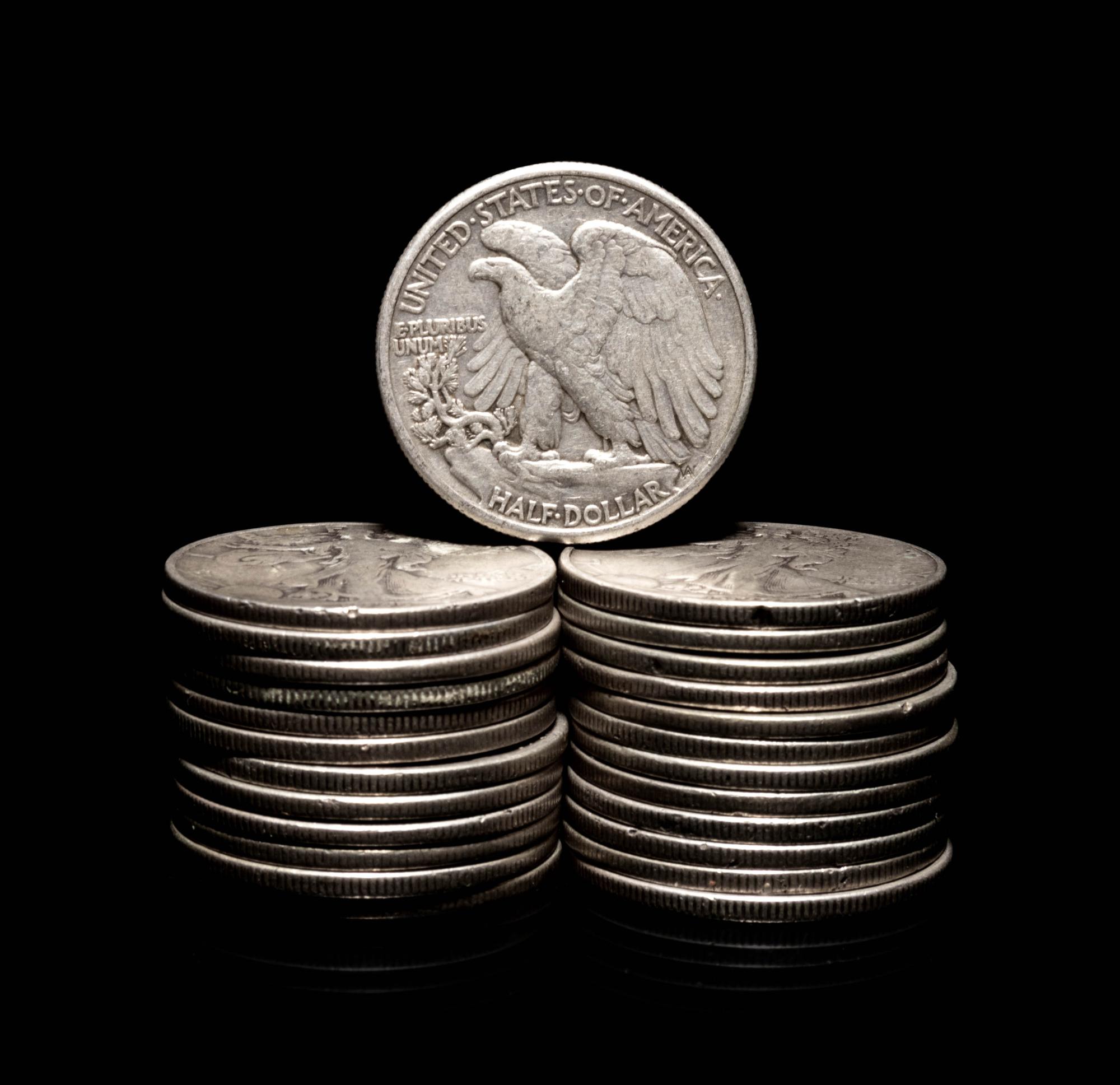 A Group of Twenty Walking Liberty 50c Coins