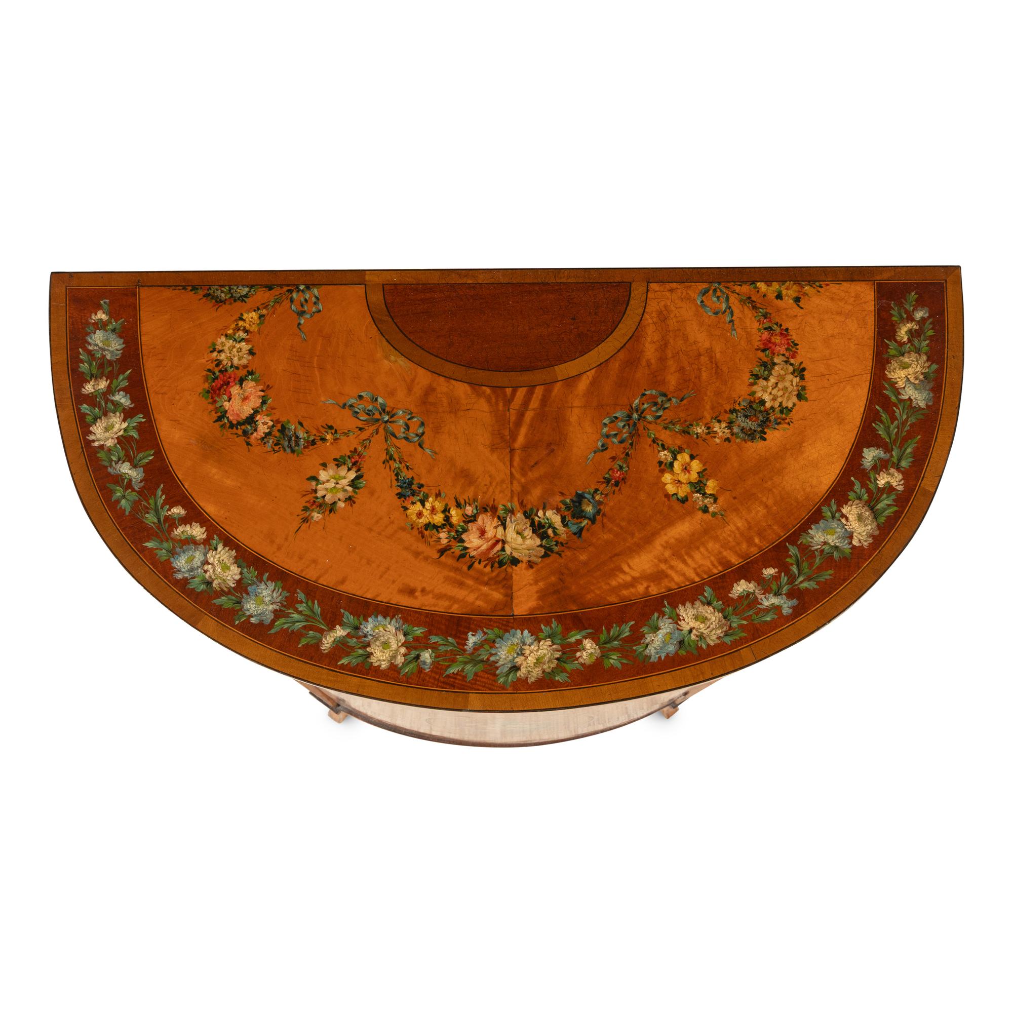 An Edwardian Mahogany, Satinwood and Polychrome Painted Demilune Cabinet