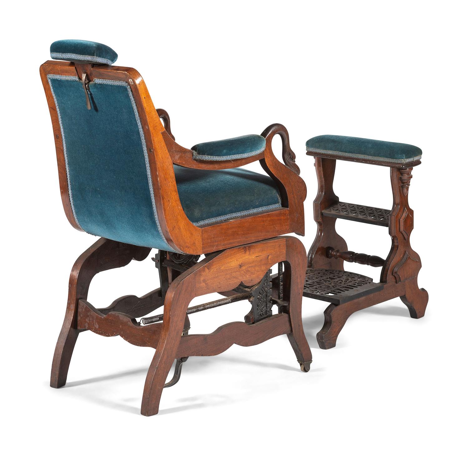An Archer Velvet Upholstered Goose Neck Walnut Barber Chair and Footstool